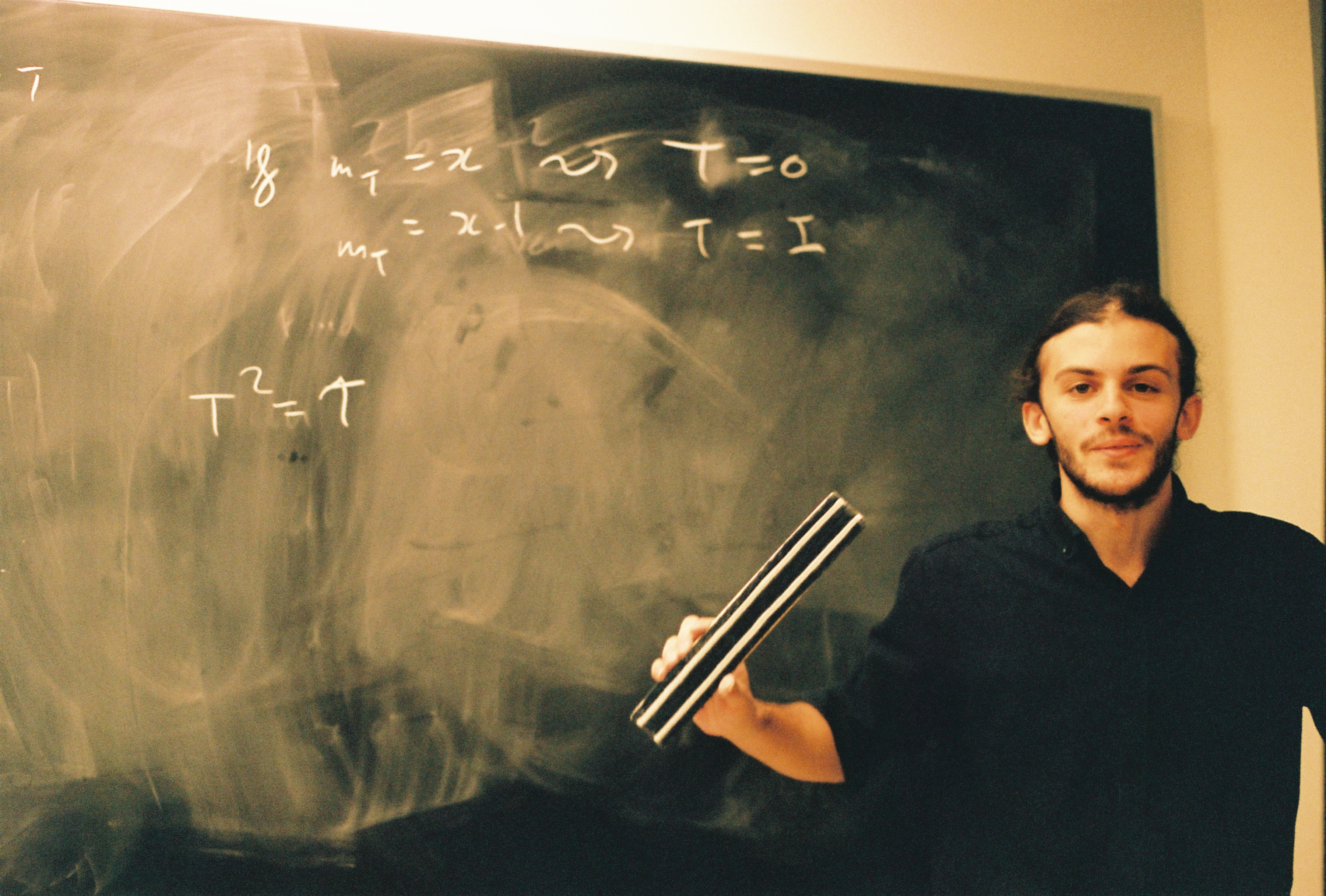 Ludovic at chalk board